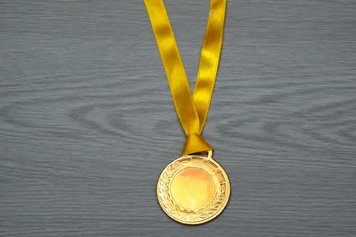 Gold excellence medal